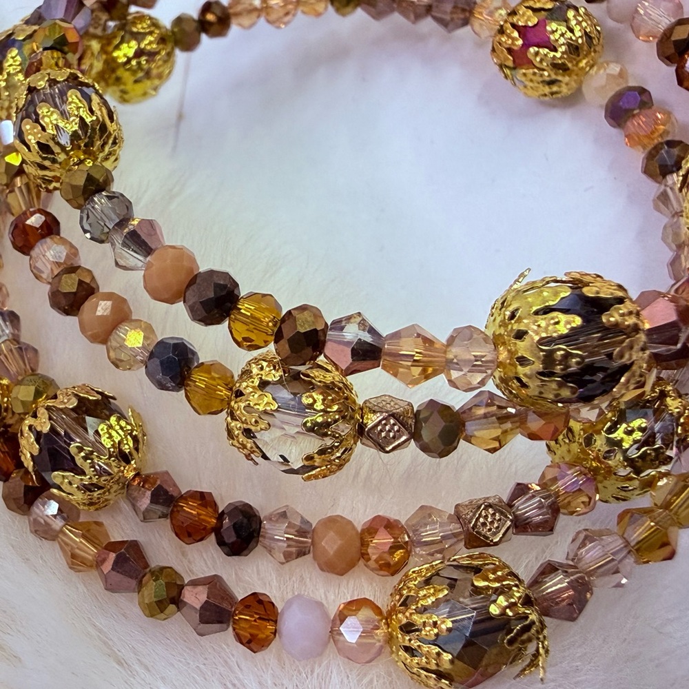 Elegant Gold and Brown Beaded Memory Wire Bracelet with Gold Tone Accents